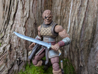 Savage Crucible's Jaeger, holding a sword in front of a mossy tree.